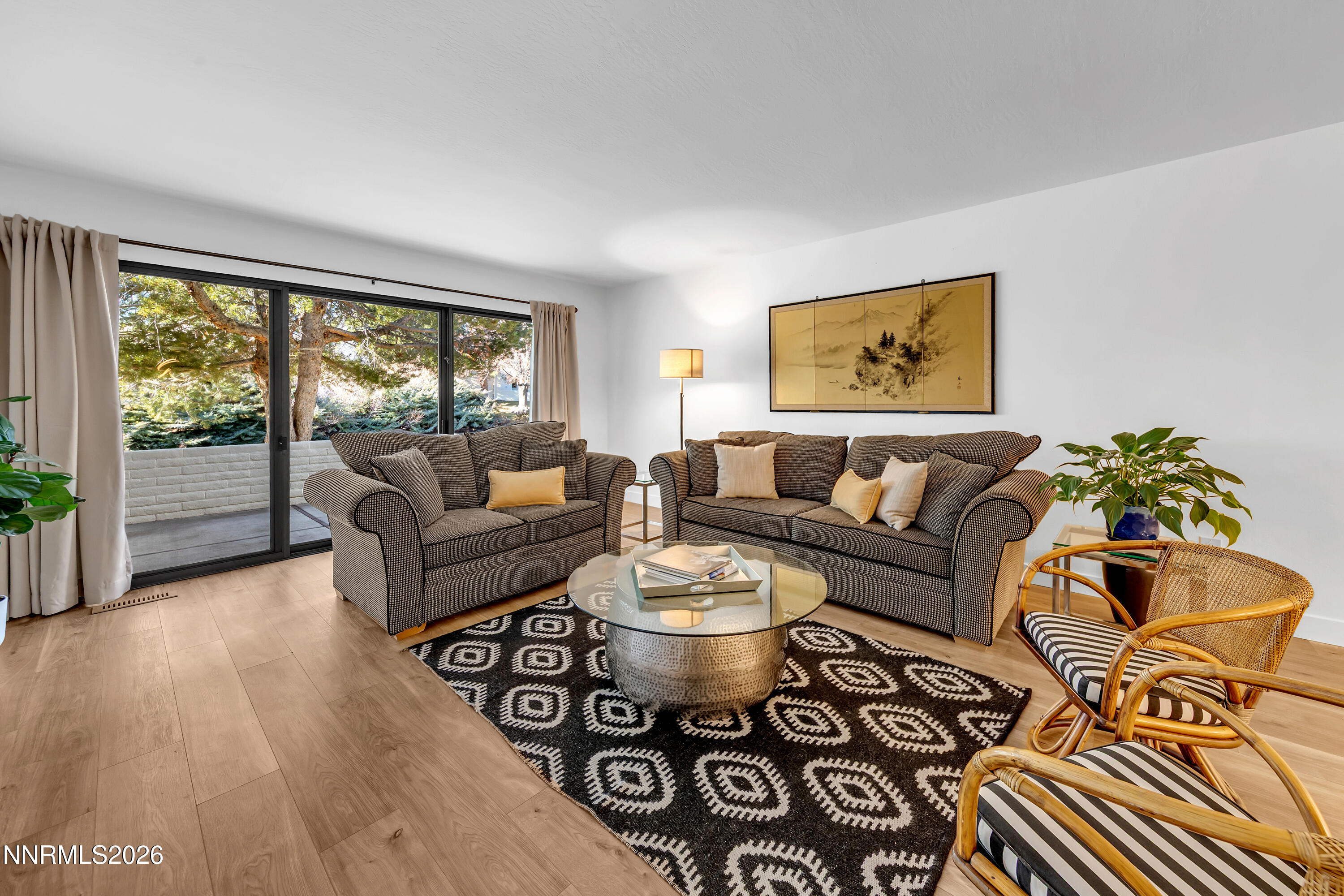 4915 Lakeridge Terrace West Reno, NV 89509 - Photo 3 of 41 a living room with furniture and a large window