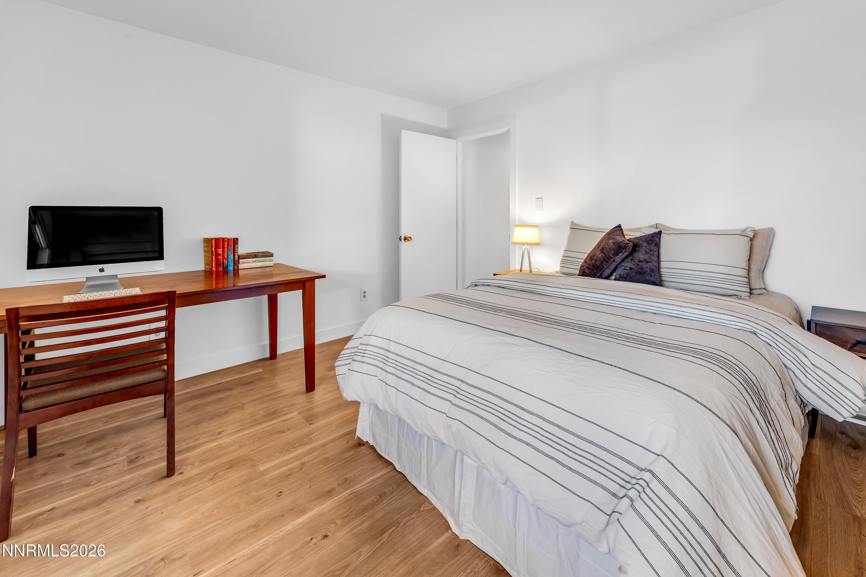 4915 Lakeridge Terrace West Reno, NV 89509 - Photo 32 of 41 a bedroom with a bed and a flat screen tv