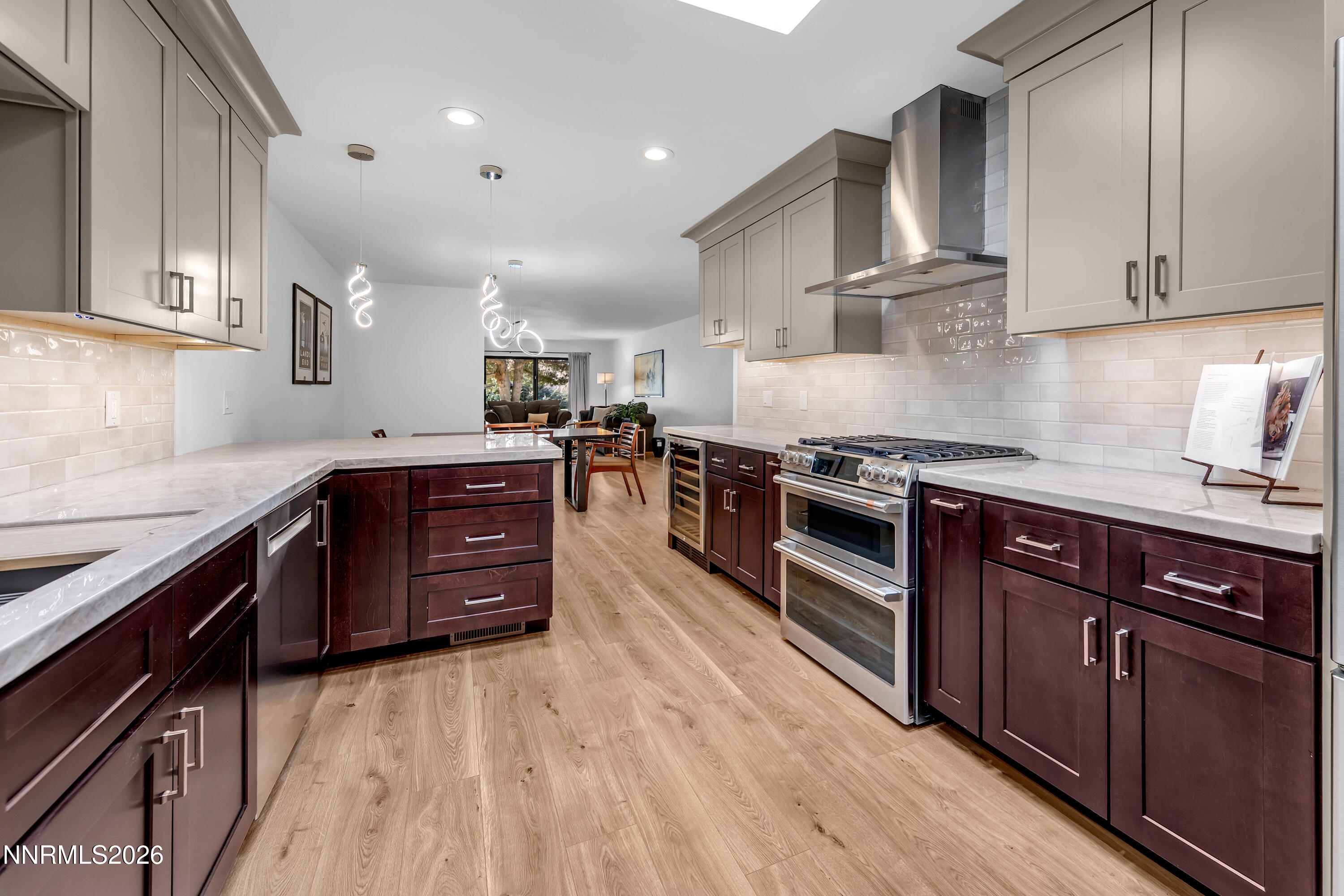 4915 Lakeridge Terrace West Reno, NV 89509 - Photo 6 of 41 a kitchen with stainless steel appliances granite countertop a stove a sink and a refrigerator