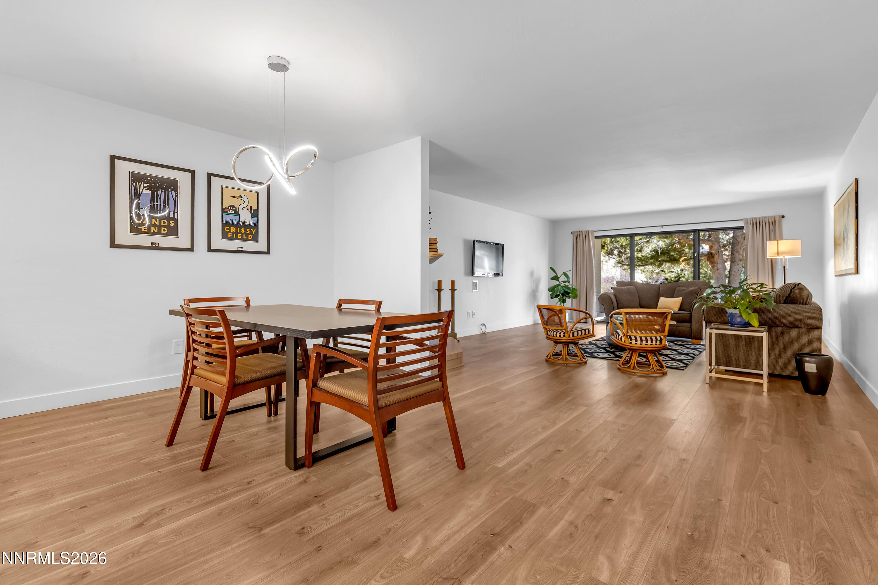 4915 Lakeridge Terrace West Reno, NV 89509 - Photo 8 of 41 a living room with furniture and a wooden floor