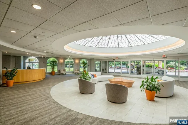 a kitchen with a table and chairs