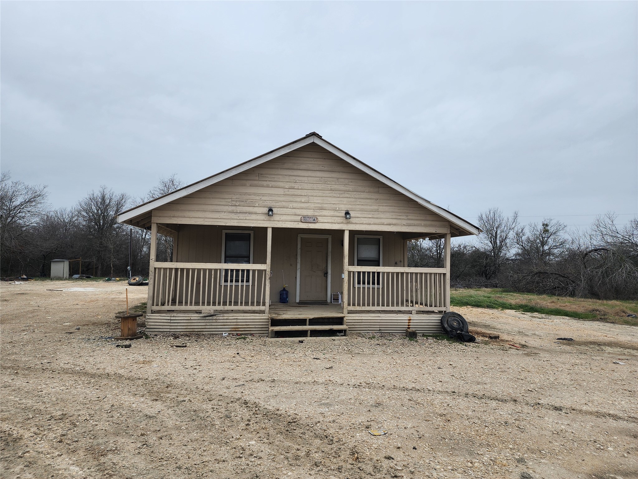 18501 Blake Manor Road Manor, TX 78653 - Photo 2 of 10 a front view of a house with a yard