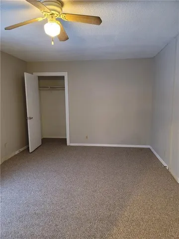 a kitchen with a sink and a microwave