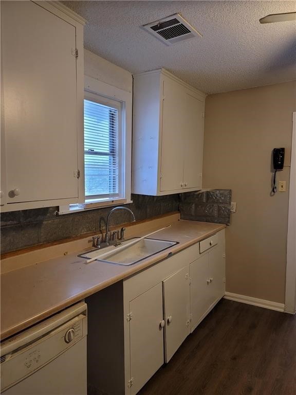 18501 Blake Manor Road Manor, TX 78653 - Photo 7 of 10 a bathroom with a sink and a mirror