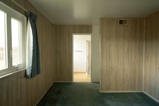 a bathroom with a toilet a sink and bathtub