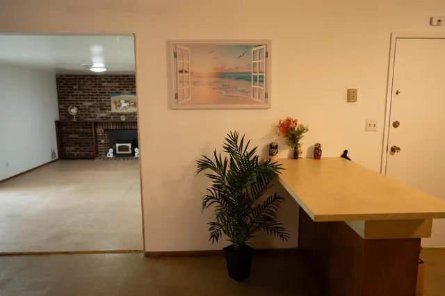 a bathroom with a toilet and shower