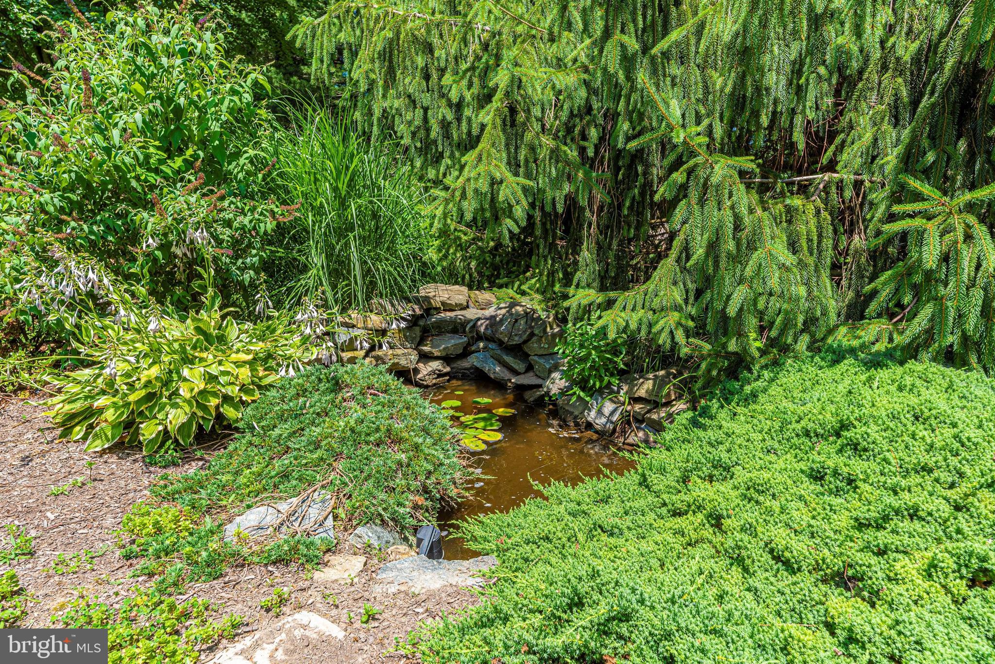5184 Perry Road Mount Airy, MD 21771 - Photo 57 of 75 Enjoy the Sound of the Waterfall at the Pond