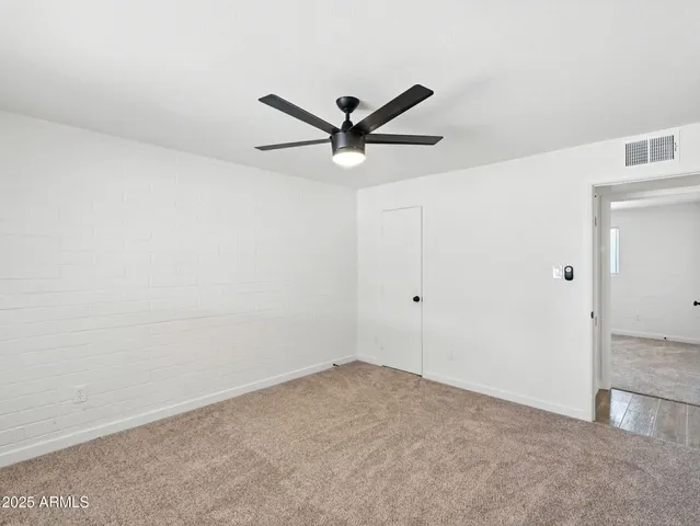 a view of a ceiling fan in a room