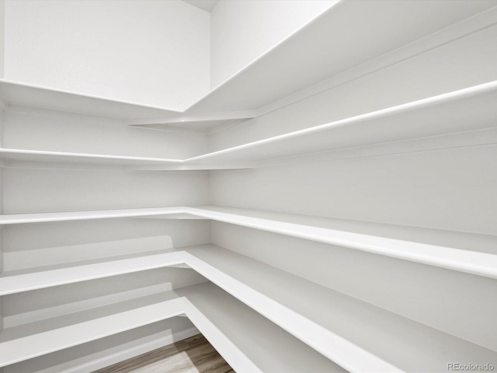 4684 Rabbitbrush Street Johnstown, CO 80534 - Photo 22 of 45 a view of small space with racks on the wall