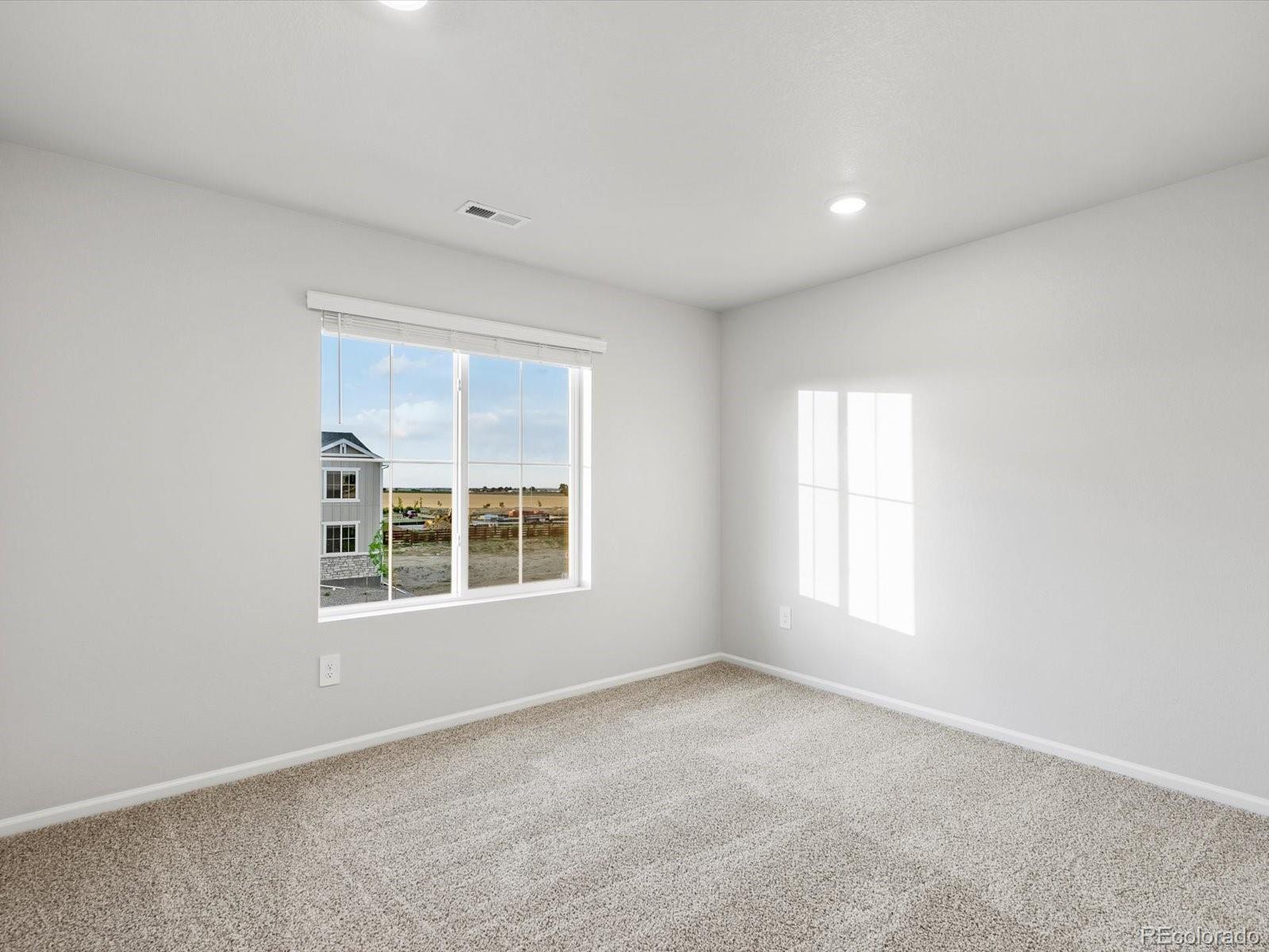 4684 Rabbitbrush Street Johnstown, CO 80534 - Photo 27 of 45 an empty room with a window