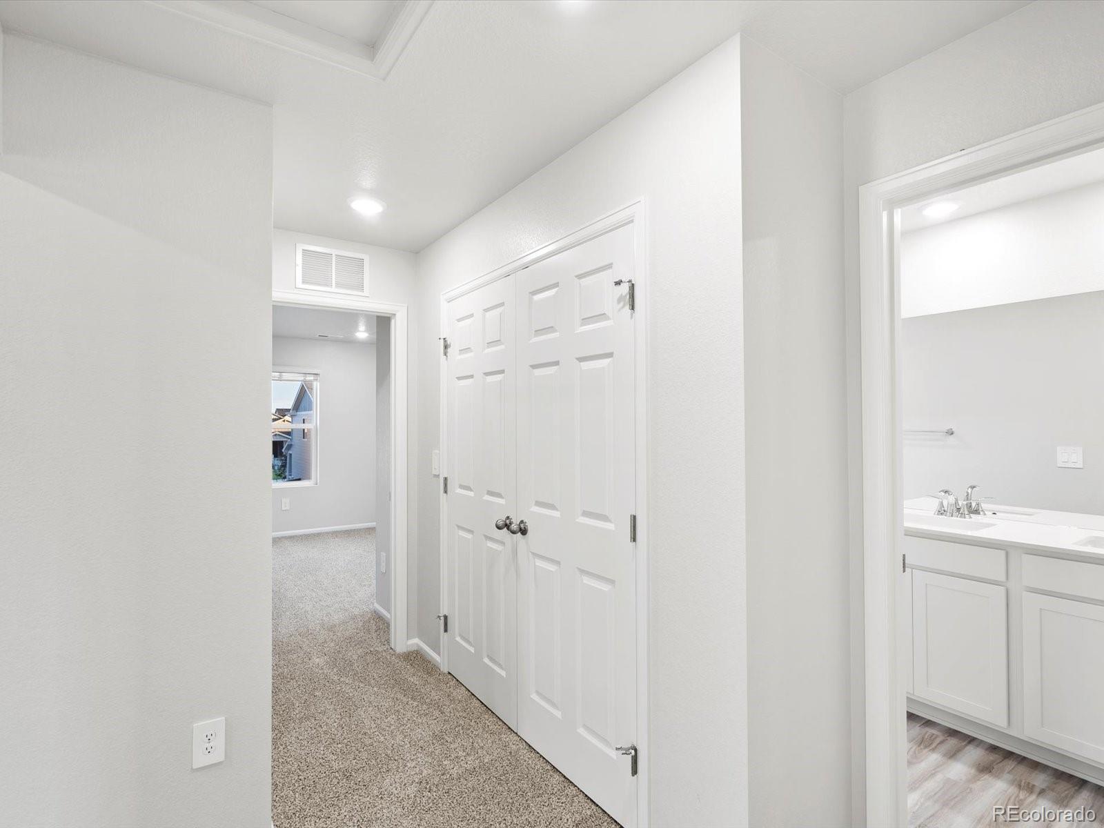 4684 Rabbitbrush Street Johnstown, CO 80534 - Photo 35 of 45 a bathroom with a sink and mirror
