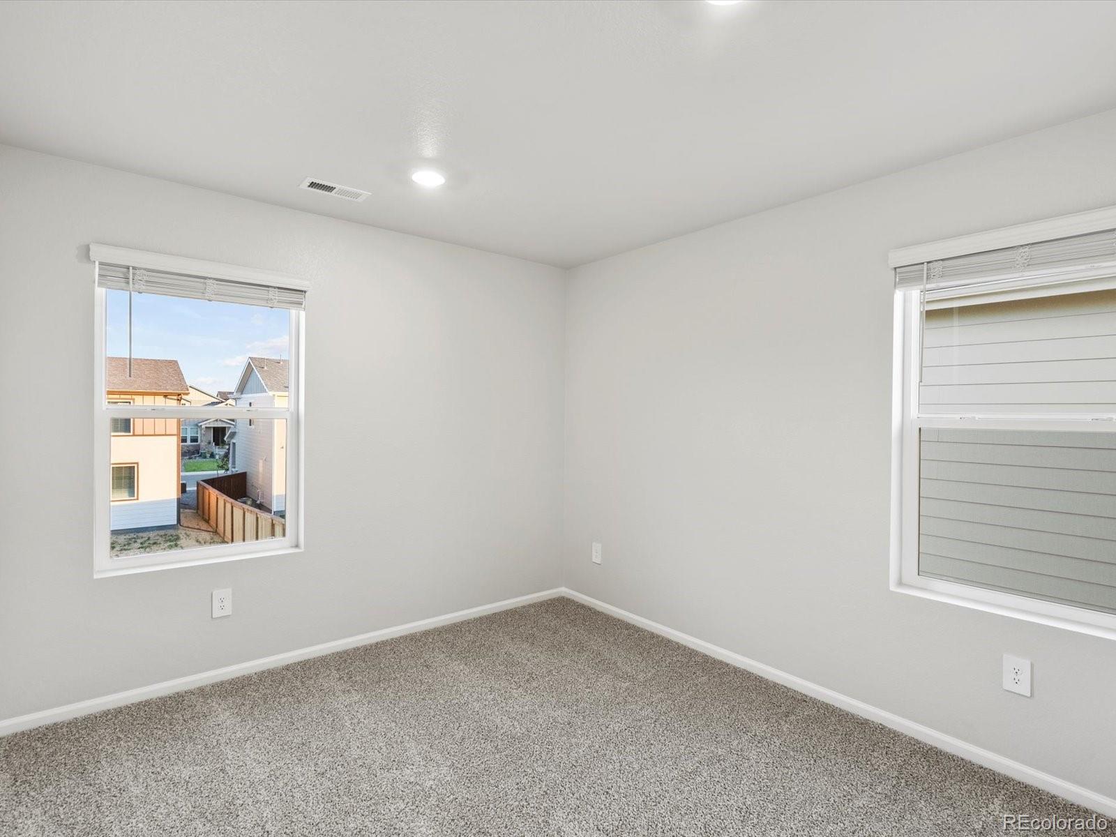 4684 Rabbitbrush Street Johnstown, CO 80534 - Photo 39 of 45 an empty room with a window