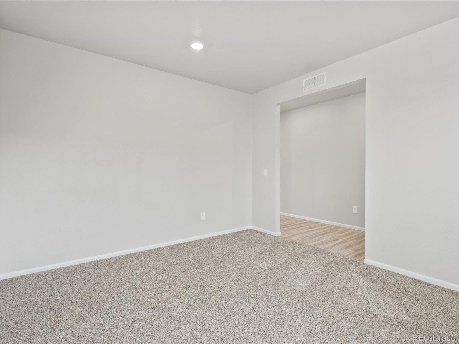 4684 Rabbitbrush Street Johnstown, CO 80534 - Photo 6 of 45 a view of an empty room