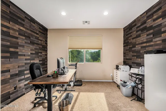 a bathroom with a tub and shower