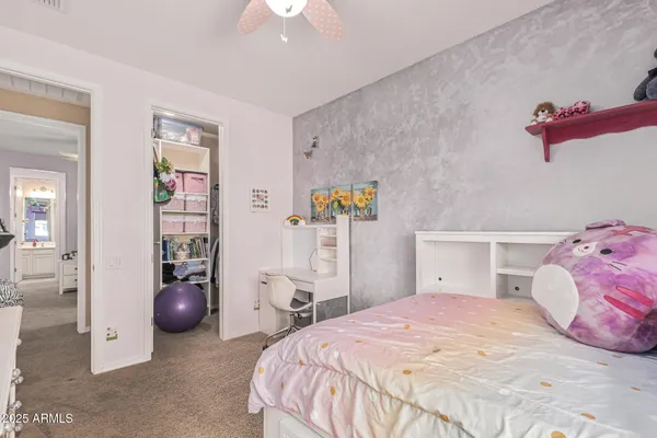 a swimming pool with outdoor seating and yard