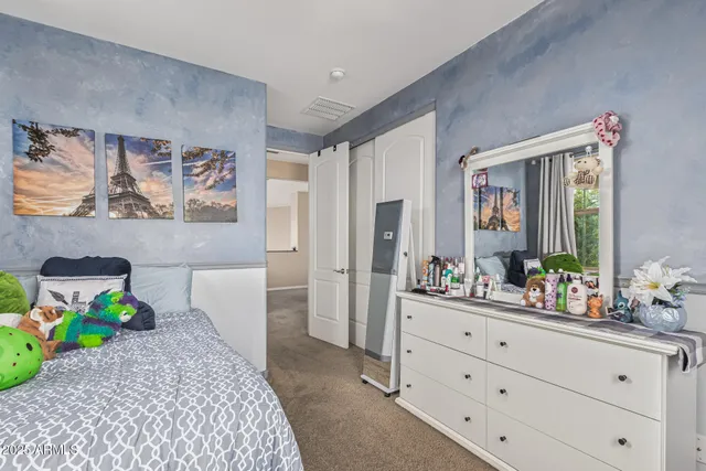 a view of a backyard with sitting area