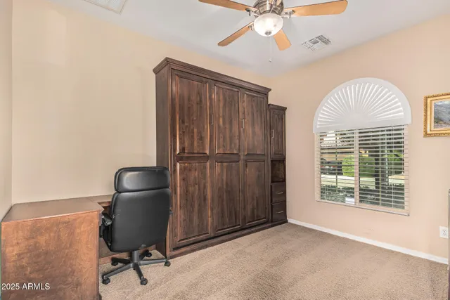 a view of dining room with furniture wooden floor and windows