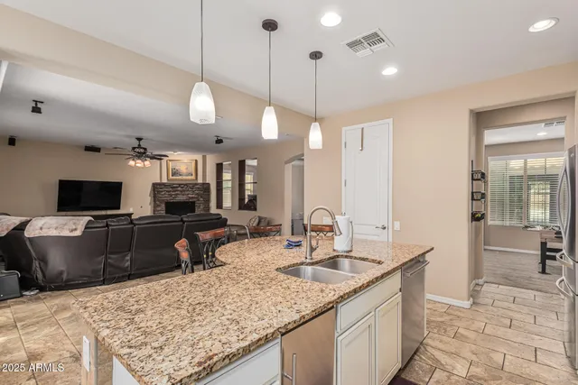 a bedroom with a bed and a television