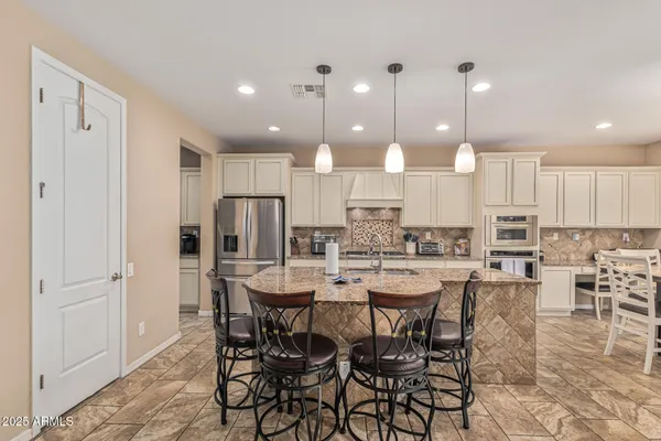 a view of a workspace with furniture