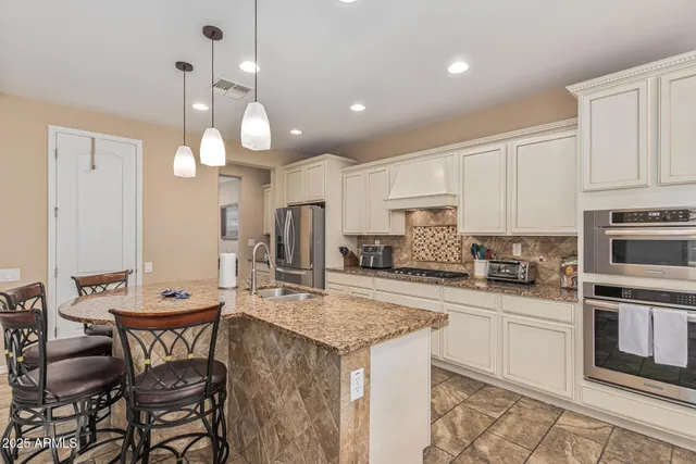 a view of a workspace with furniture