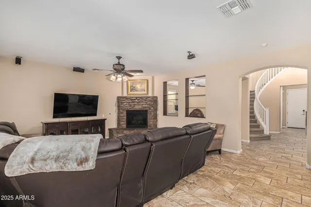a living room with furniture and a window