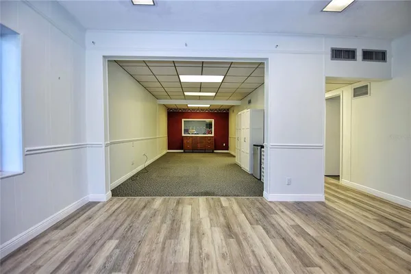 a view of entryway with wooden floor