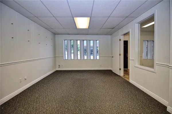 a view of an empty room with a window