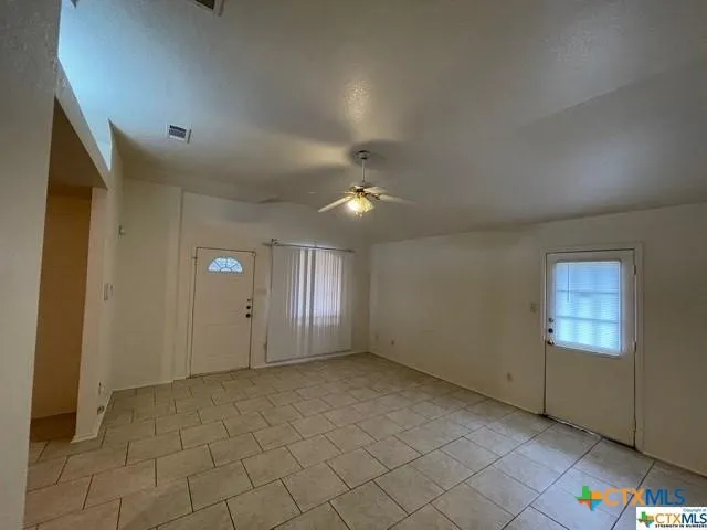 a view of a room with a window