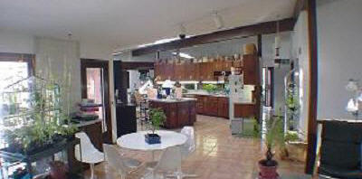1880 Yale Bridge Road South Beloit, IL 61080 - Photo 2 of 5 a dining room with furniture and a potted plant