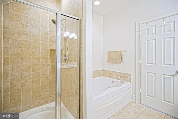 a view of a bathroom with a bathtub