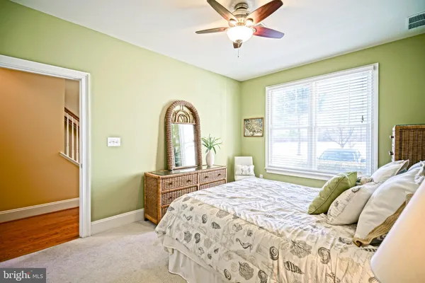a bedroom with a bed and a closet