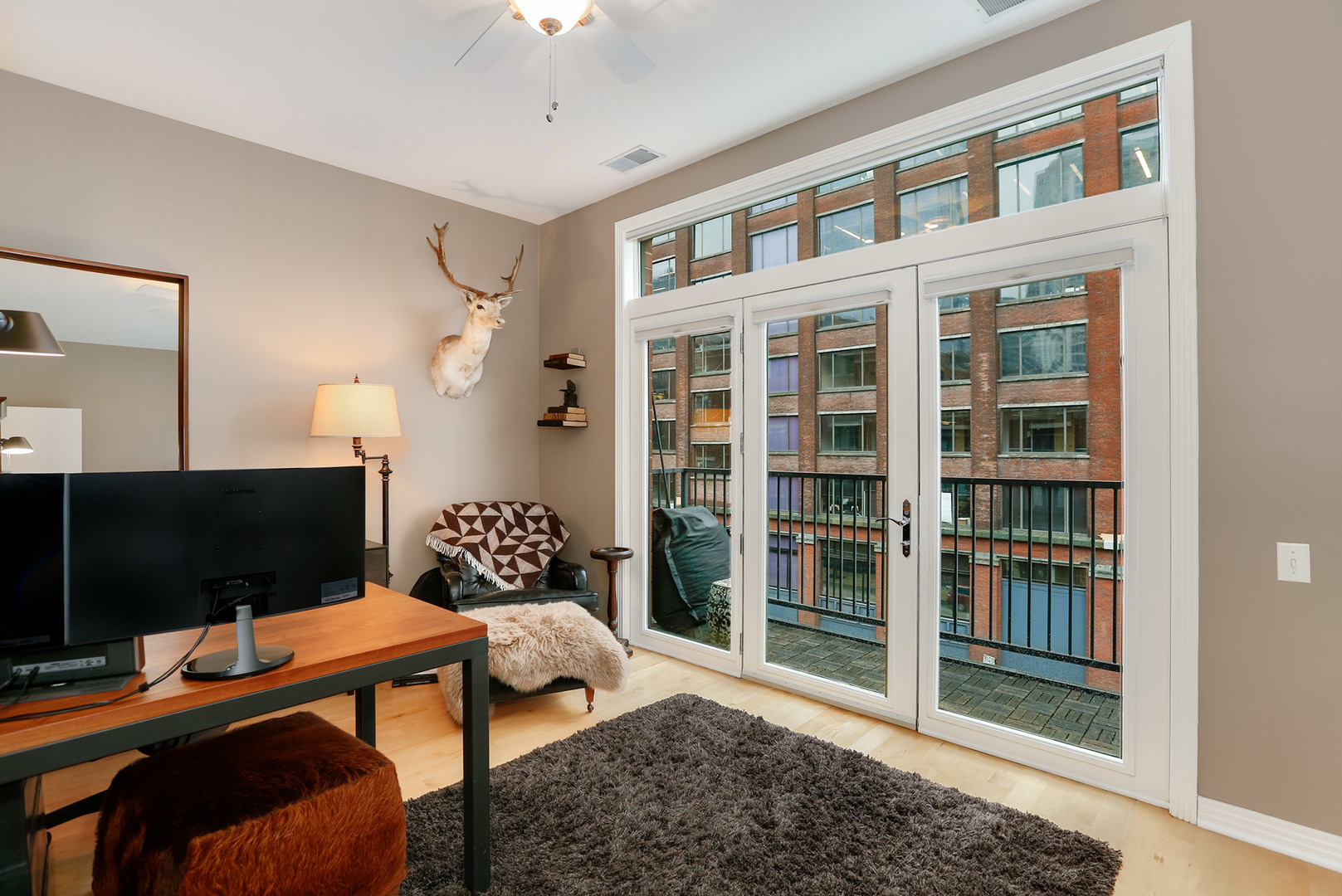 321 North Jefferson Street, Unit 401 Chicago, IL 60661 - Photo 17 of 33 a bedroom with furniture and a window