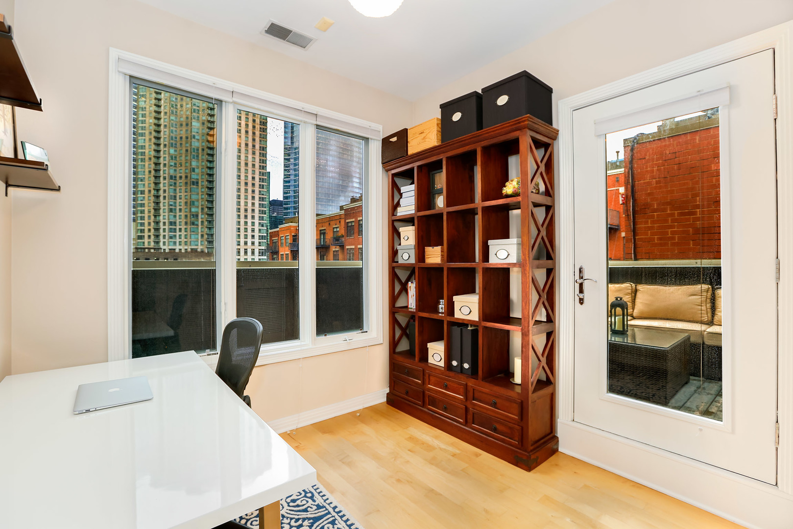 321 North Jefferson Street, Unit 401 Chicago, IL 60661 - Photo 22 of 33 a view of a bedroom with furniture and front door