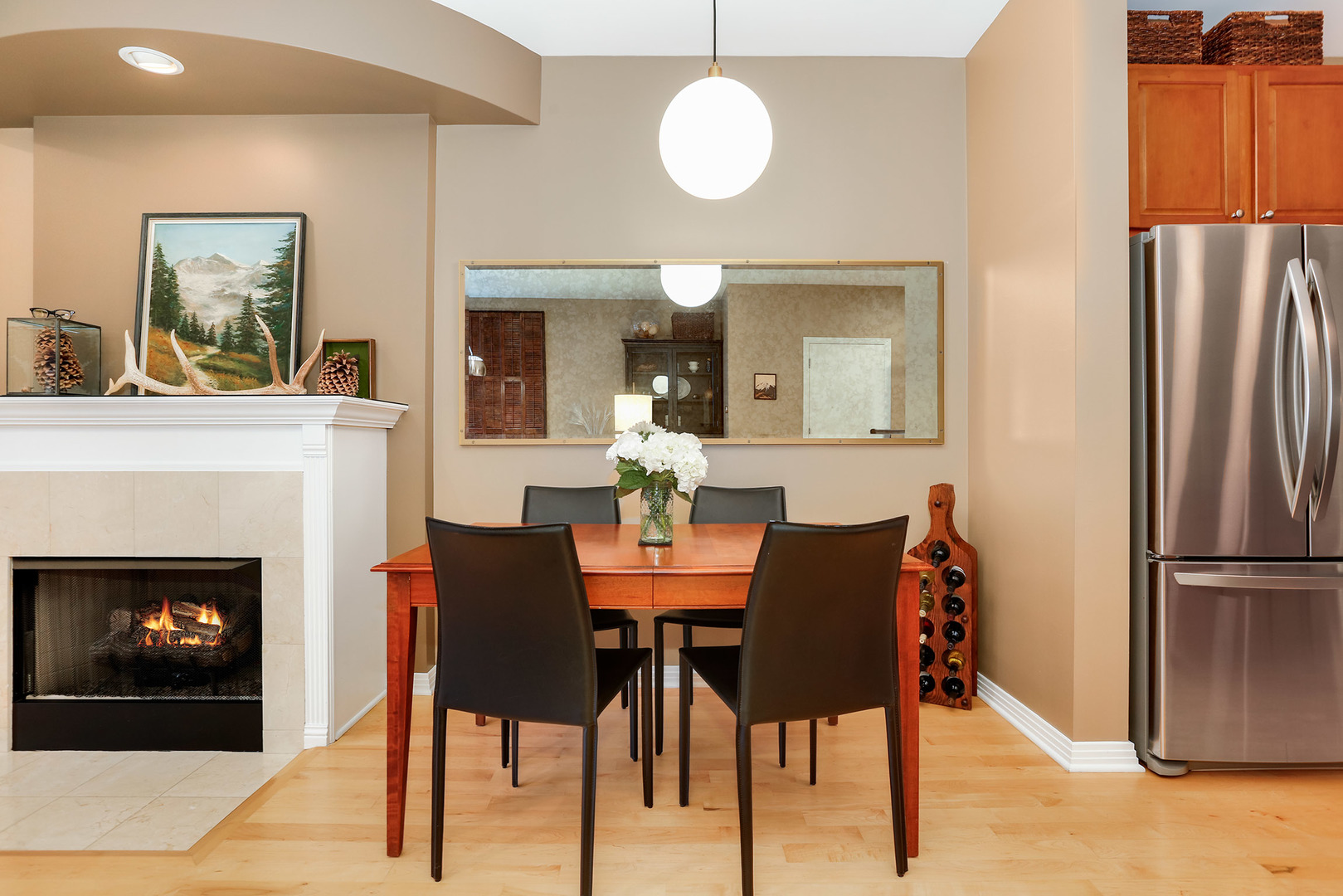 321 North Jefferson Street, Unit 401 Chicago, IL 60661 - Photo 10 of 33 a dining room with furniture and a fireplace