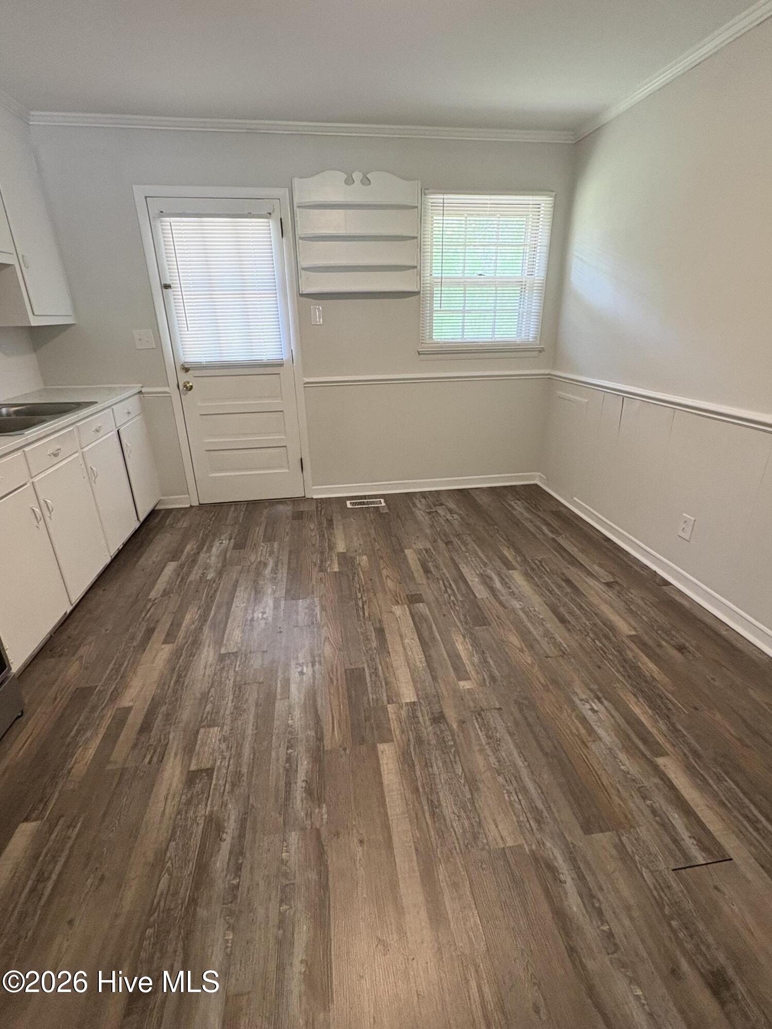 4352 Eastern Pines Road, Unit 18 Greenville, NC 27858 - Photo 7 of 9 Kitchen- Backdoor