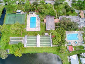 8 Southeast Casa Rio Road Port St. Lucie, FL 34952 - Photo 2 of 18 2 pools, tennis etc.