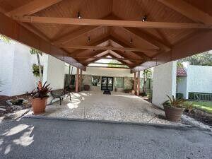 8 Southeast Casa Rio Road Port St. Lucie, FL 34952 - Photo 3 of 18 Spanish lakes clubhouse