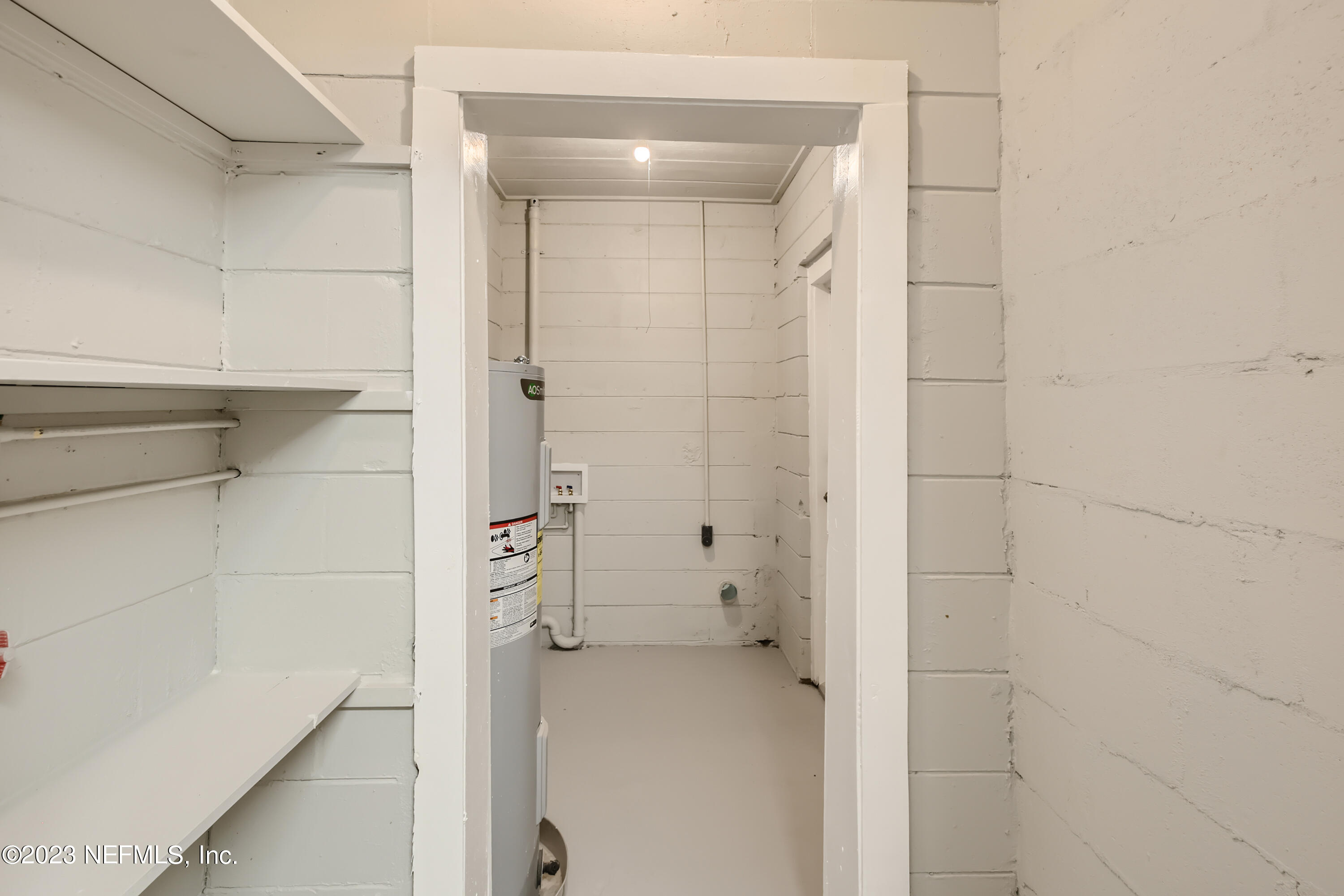 5730 Moncrief Road Jacksonville, FL 32209 - Photo 28 of 37 a bathroom with a bathtub and a shower