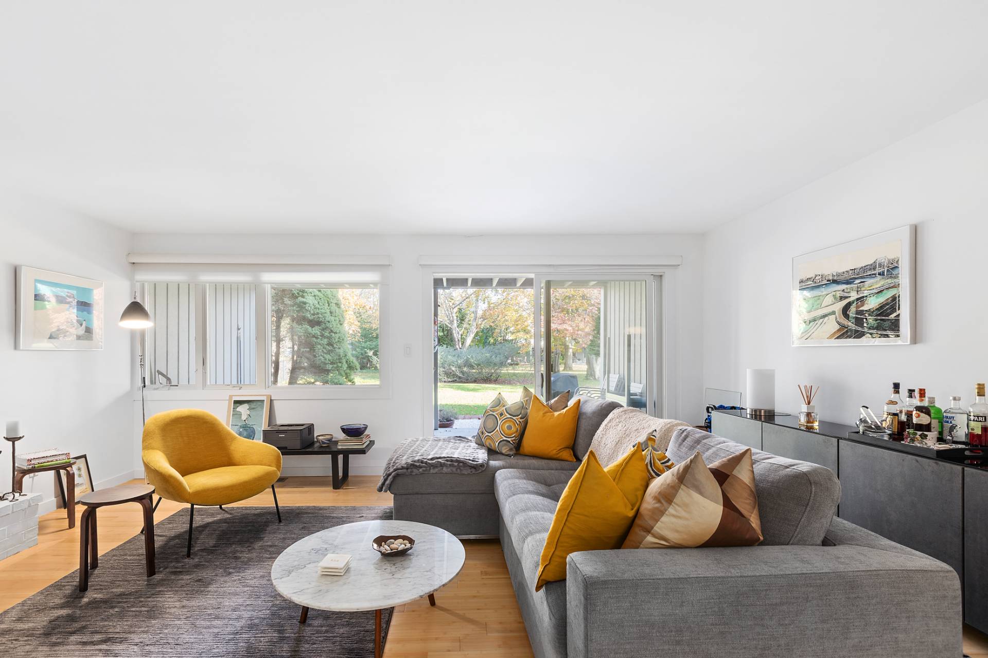 514 Pantigo Road, Unit 7 East Hampton, NY 11937 - Photo 2 of 14 a living room with furniture and a window