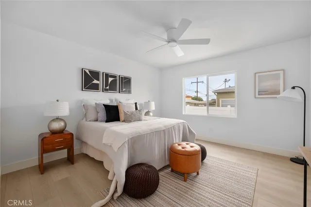 a bedroom with a bed and a chair