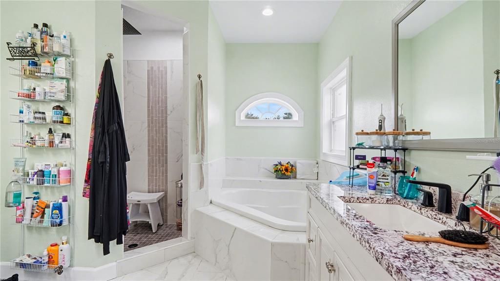 5211 Southwest 103rd Loop Ocala, FL 34476 - Photo 13 of 18 a very nice looking room with a lot of stuff