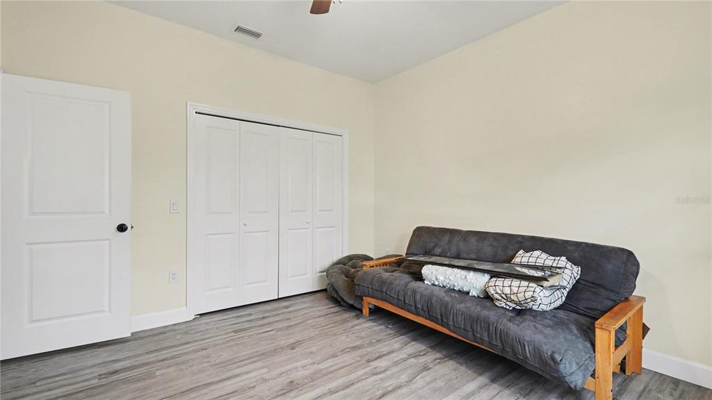5211 Southwest 103rd Loop Ocala, FL 34476 - Photo 8 of 18 a living room with furniture