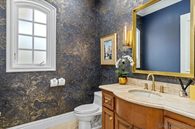 a view of a dining room with furniture and window