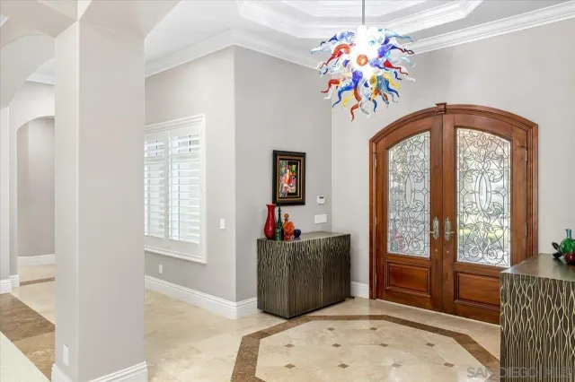 a living room with furniture and window