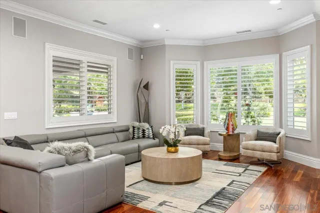 a kitchen with stainless steel appliances granite countertop a sink and a stove