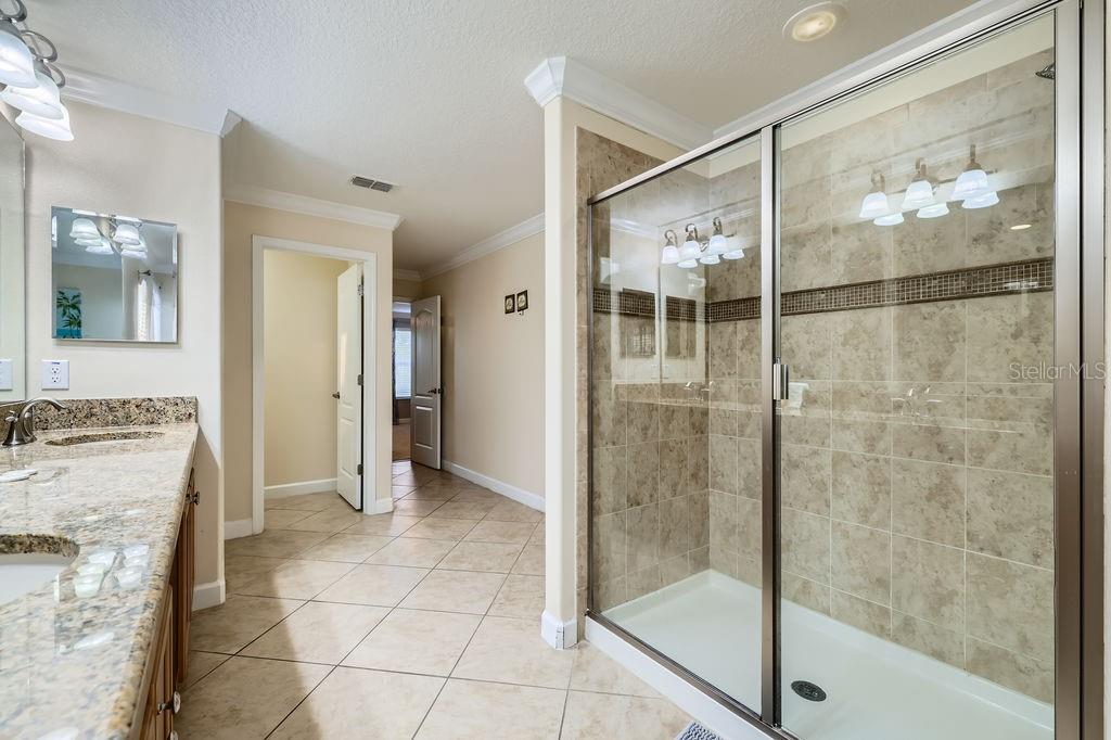 2999 Buccaneer Palm Road Kissimmee, FL 34747 - Photo 20 of 49 a bathroom with a shower and a sink