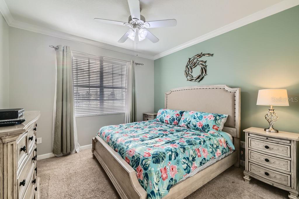 2999 Buccaneer Palm Road Kissimmee, FL 34747 - Photo 21 of 49 a bedroom with a bed and a window