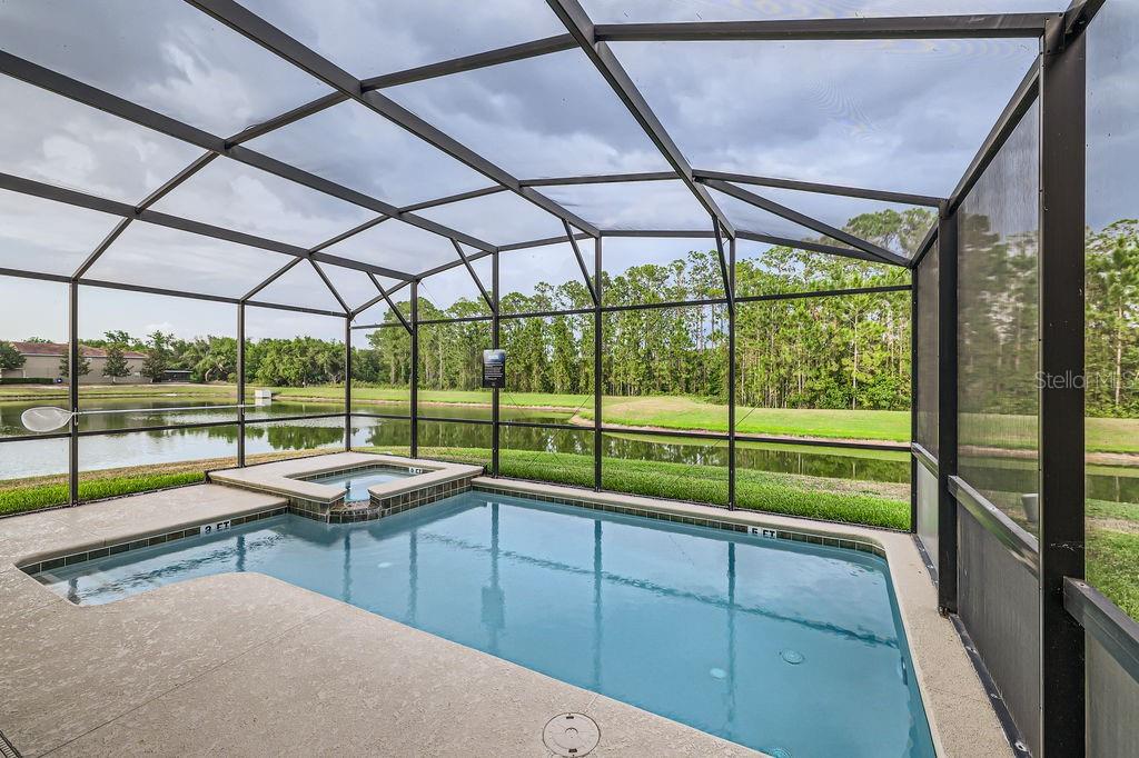 2999 Buccaneer Palm Road Kissimmee, FL 34747 - Photo 3 of 49 a view of a room with wooden floor and iron stairs