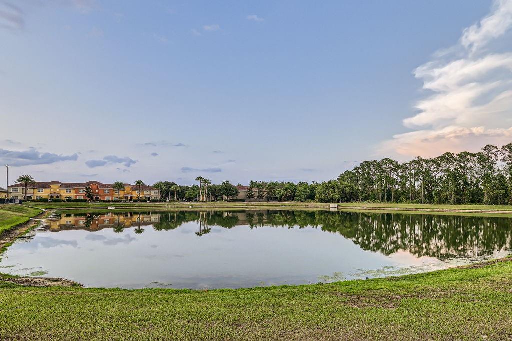 2999 Buccaneer Palm Road Kissimmee, FL 34747 - Photo 36 of 49 a view of a lake with houses in the back