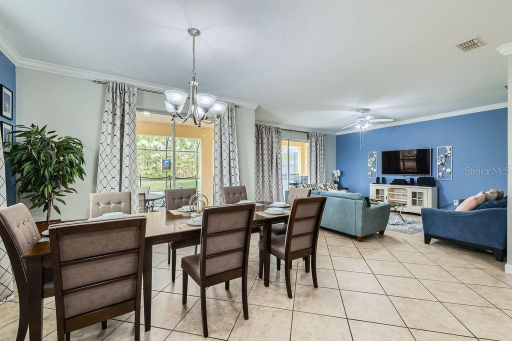 2999 Buccaneer Palm Road Kissimmee, FL 34747 - Photo 10 of 49 a view of a livingroom with furniture and window